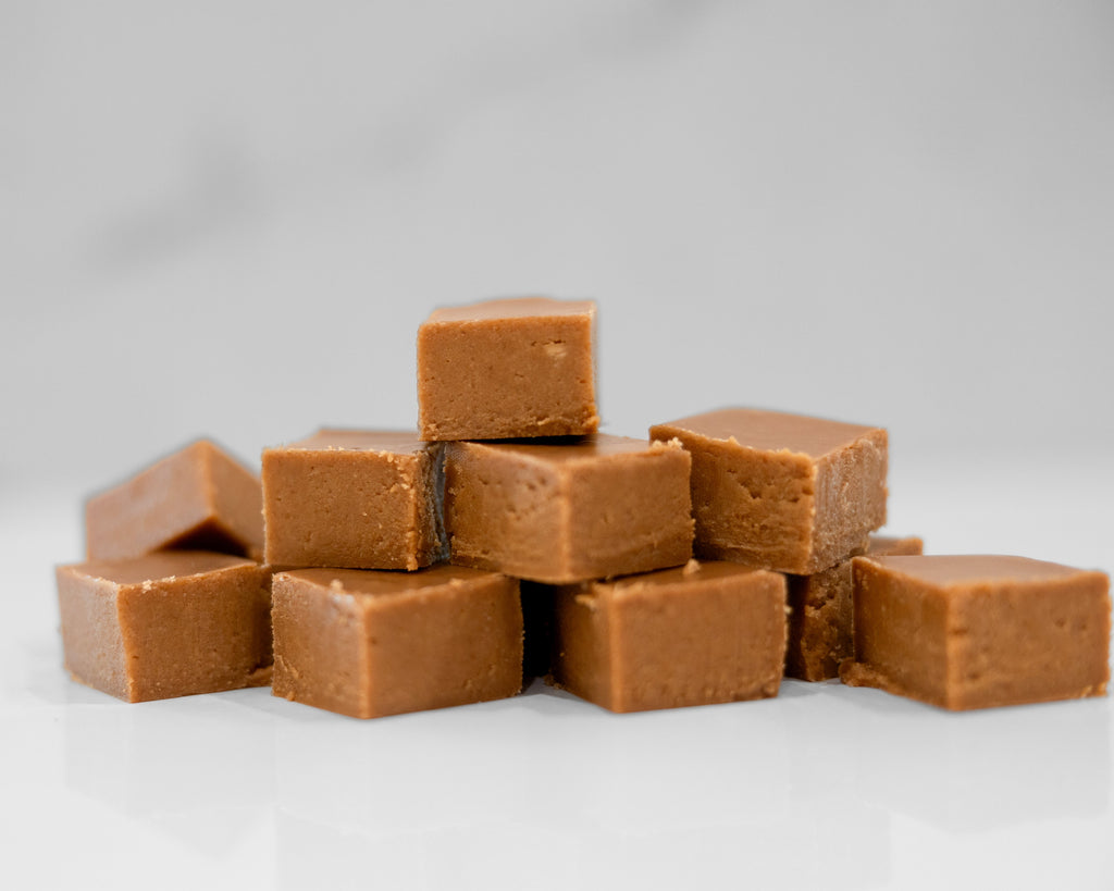 Handcrafted Coffee Fudge – Smooth, rich, and creamy fudge infused with bold coffee flavor. Made in small batches with real butter and no corn syrup for a gourmet melt-in-your-mouth treat.