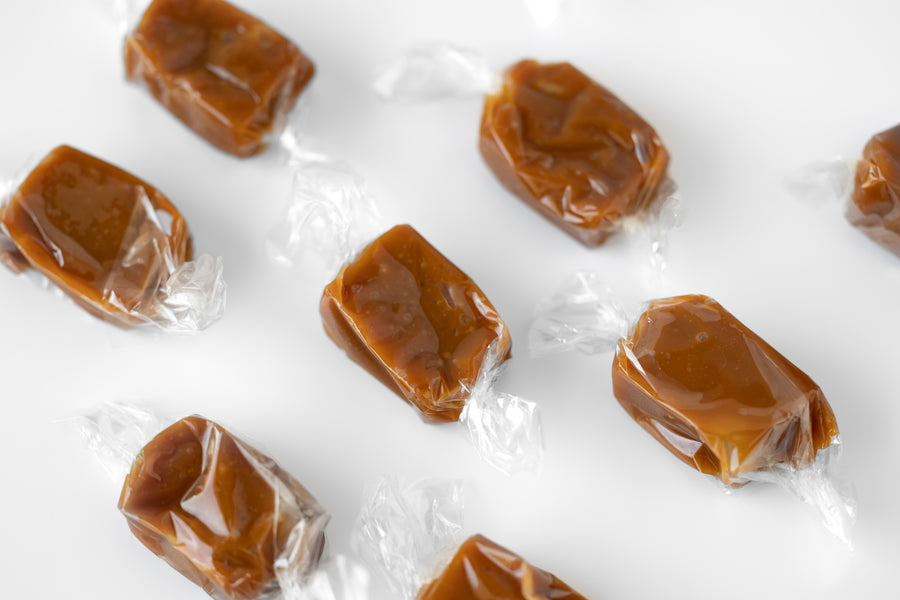 Close-up of handmade salted caramels individually wrapped